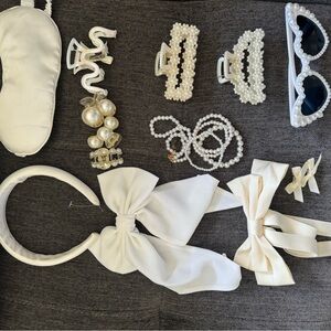 Various accessories for bachelorette party. Bows, glasses, silk headband.